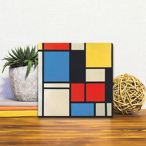 A Slidetile of the A Composition of Colors sitting on a table.