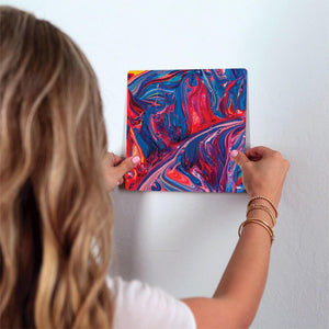 Blue and Red Swirl Slidetile on wall in office.