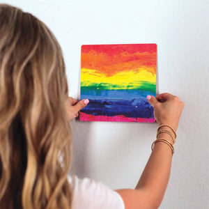 Over the Rainbow Slidetile on wall in office.
