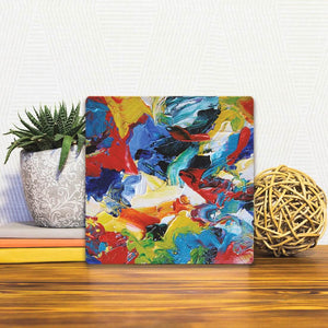 A Slidetile of the Day and Ocean sitting on a table.