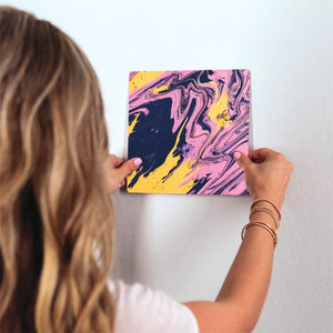 Purple and Yellow Swirls Slidetile on wall in office.
