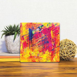 A Slidetile of the Pink and Yellow sitting on a table.
