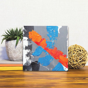 A Slidetile of the Red Blue Stripe sitting on a table.