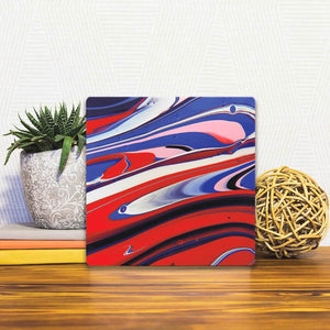 A Slidetile of the Red and Blue Waves sitting on a table.