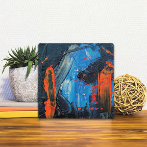 A Slidetile of the Red and Blue sitting on a table.