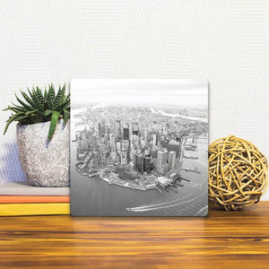 A Slidetile of the New York Black & White sitting on a table.