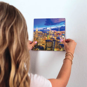 New York Skyline at Night Slidetile on wall in office.