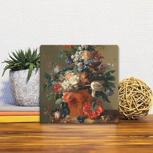A Slidetile of the Vase of Flowers by Huysum sitting on a table.