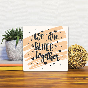 A Slidetile of the We are better together sitting on a table.