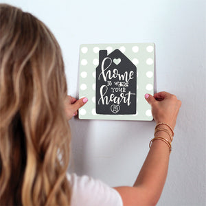 Home is where the heart is Slidetile on wall in office.
