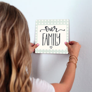 Our Family Slidetile on wall in office.