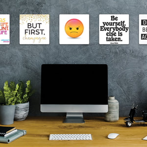 Model mounting Angry Emoji Slidetile to the wall.