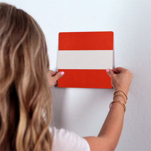 The Austrian Flag Slidetile on wall in office.
