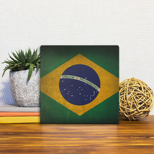A Slidetile of the The Brazil Grunge Flag sitting on a table.