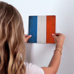 The French Grunge Flag Slidetile on wall in office.