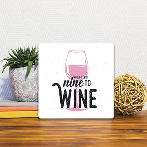A Slidetile of the Nine to Wine sitting on a table.