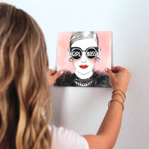 Girl Boss Slidetile on wall in office.