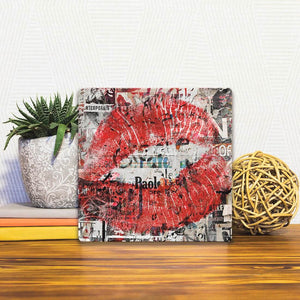 A Slidetile of the Urban Lips sitting on a table.