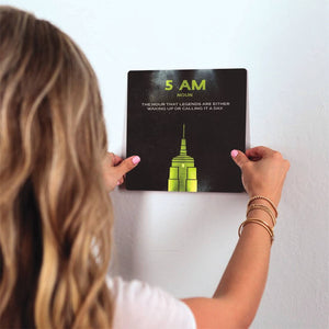 Definition of 5am Slidetile on wall in office.