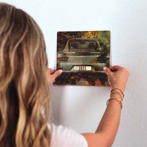 Bosses Drive Porsches Slidetile on wall in office.