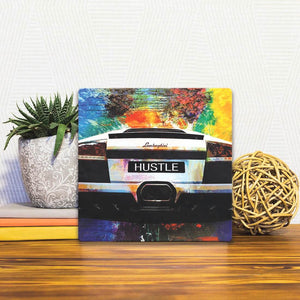 A Slidetile of the Drive and Hustle sitting on a table.
