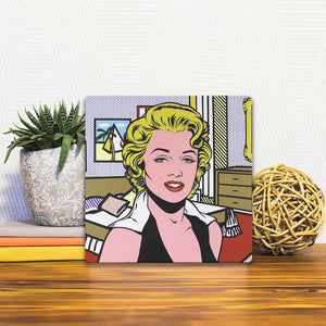 A Slidetile of the Monroe's Bedroom sitting on a table.