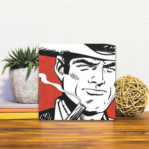 A Slidetile of the Cowboy Up sitting on a table.