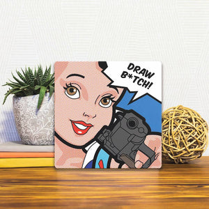 A Slidetile of the Draw Bitch sitting on a table.