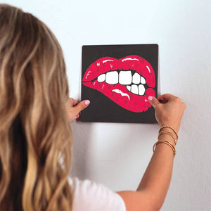 Lips of Luxury Slidetile on wall in office.