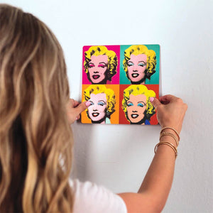 Monroe x 4 Slidetile on wall in office.