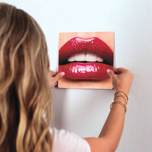 Delicious Lips Slidetile on wall in office.