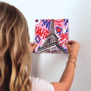 Eiffel Tower Graffiti Slidetile on wall in office.