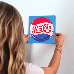 Vintage Pepsi Slidetile on wall in office.