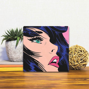 A Slidetile of the Pink Beauty sitting on a table.