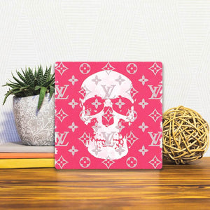 A Slidetile of the Pink Decadence sitting on a table.