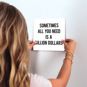 A Billion Dollars Slidetile on wall in office.