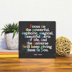 A Slidetile of the Focus on the Powerful Part of Life sitting on a table.