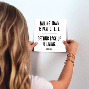 Getting back up is living… Slidetile on wall in office.
