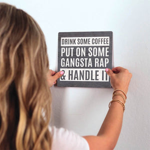 Handle It Slidetile on wall in office.