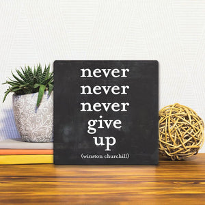 A Slidetile of the Winston Churchill - Never give up sitting on a table.