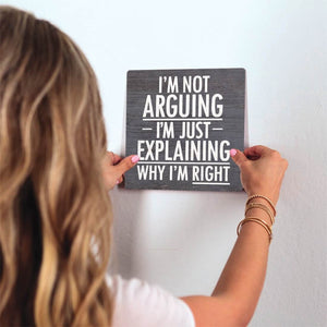 I'm Not Arguing Slidetile on wall in office.