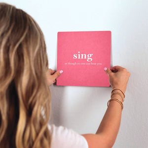 Sing as though no one can hear you Slidetile on wall in office.