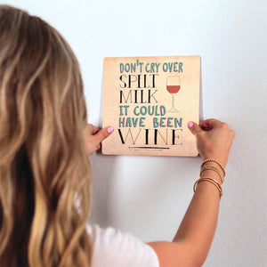 Don't cry over spilt milk… Slidetile on wall in office.