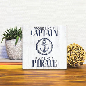 A Slidetile of the Work like a captain… sitting on a table.