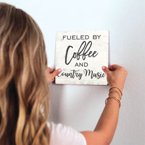 Coffee and Country Music Slidetile on wall in office.
