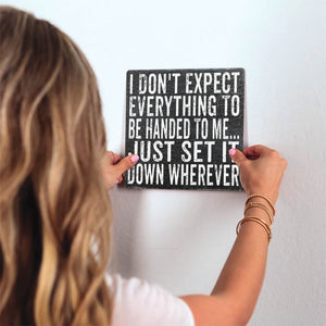 Set It Down Wherever Slidetile on wall in office.