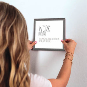 Definition of Work Slidetile on wall in office.