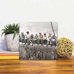 A Slidetile of the Lunch on the Girder in Color sitting on a table.