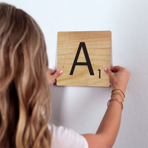 Letter A - Light Wood Slidetile on wall in office.