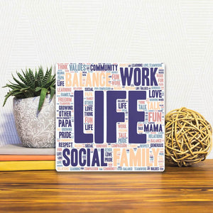 A Slidetile of the A Balanced Life sitting on a table.